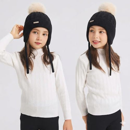 ZLYC Kids Girls Boy Winter Hat Cotton Lined Pom Pom Beanie Earflap Knit Cap - color: Solid Black
