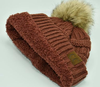 C.C Trendy Fuzzy Fleece Lined Warm Comfortable Soft Stretch Cable Knit Ribbed Faux Fur Pom Pom Beanie Hat - color: Brick