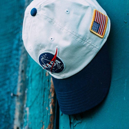 AMERICAN NEEDLE NASA Officially Licensed United Slouch Baseball Dad Buckle Strap Hat, Ivory/Navy (43570A-NASA)